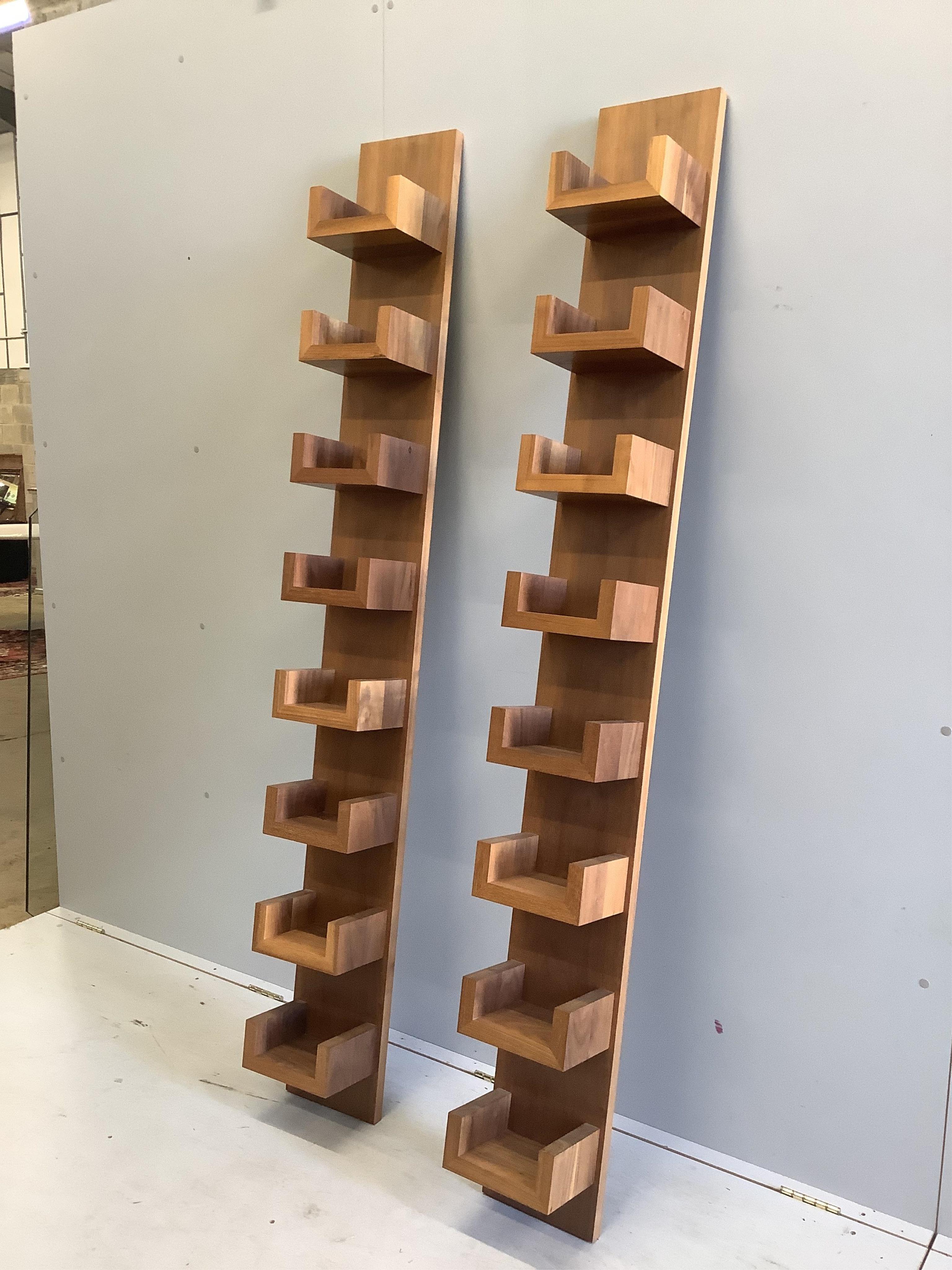 DFP, two solid walnut DVD / book shelving units, width 23cm, depth 18cm, height 194cm. Condition - good